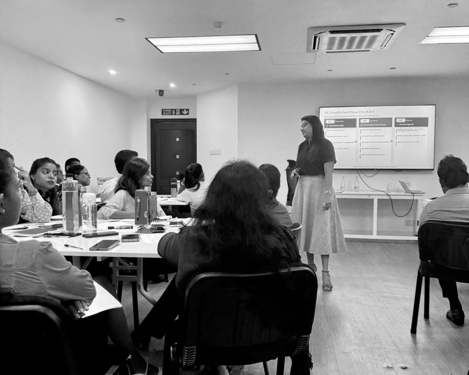 Participants following the AR month-end close checklist